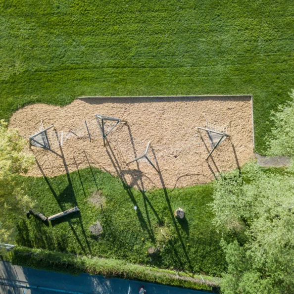 aerial-view-of-empty-playground-in-park-with-toys-2025-10-11-10-52-22-utc